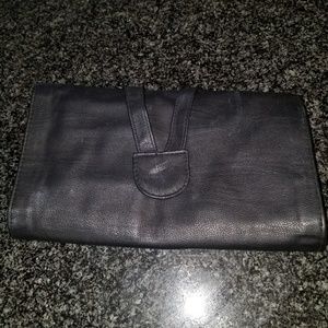 Leather brush roll for makeup brushes